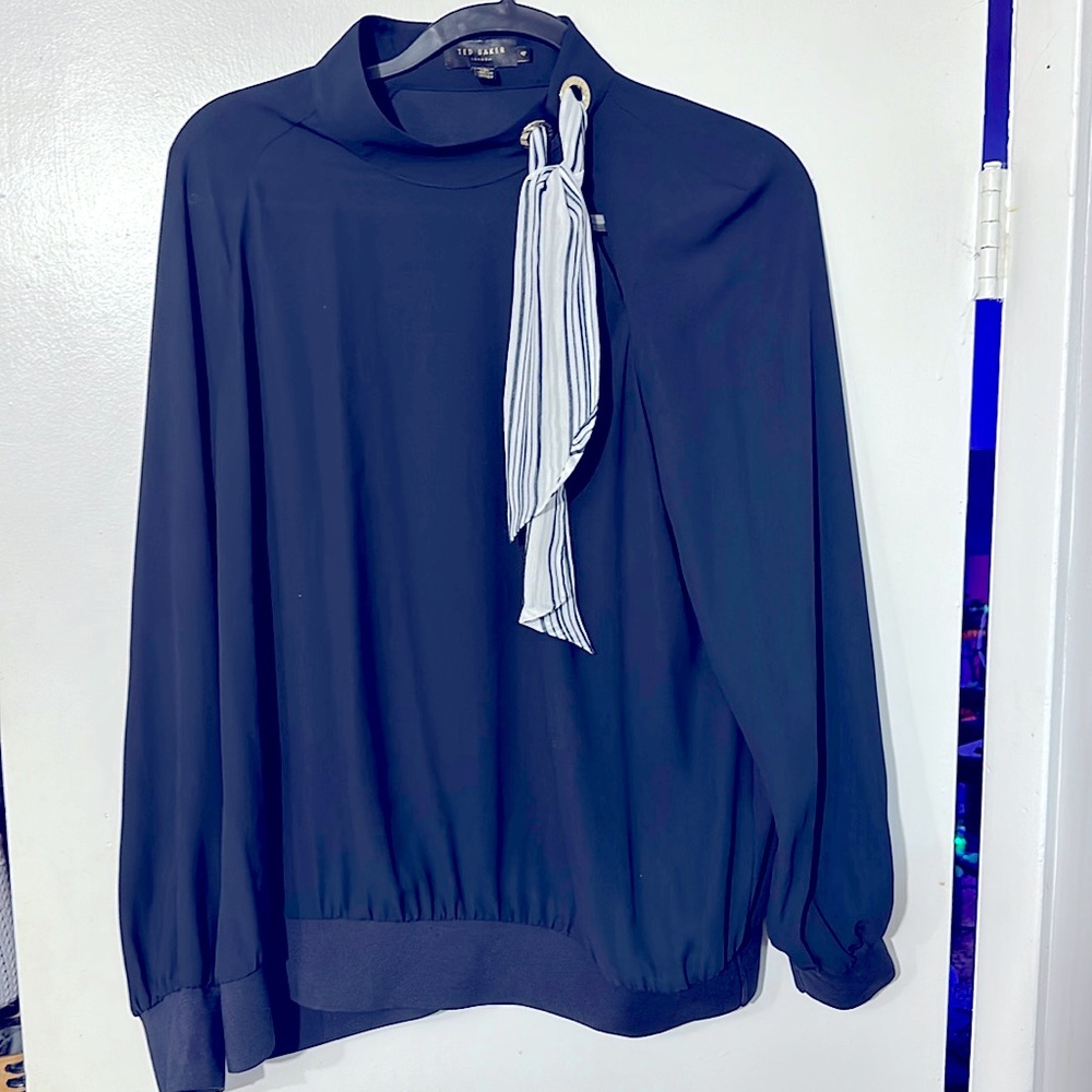 NWOT. Woman’s Ted Baker London long sleeve top, with scarf neck tie. Size 4.